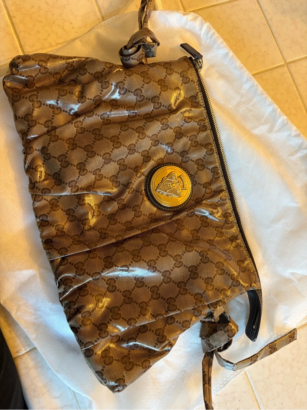 Gucci Brown Patent Monogram pouch Bag with Gold Emblem